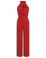 Eleganter Neckholder-Jumpsuit mit Schleife in Orange