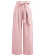 Plissierte Hose mit weitem Bein und Fliege und Schärpe in Rosa