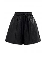 Urban Chic – Schwarze Shorts aus Kunstleder mit Kordelzug