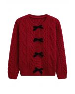 Strickjacke mit geflochtener Schleife und Druckknopf in Rot