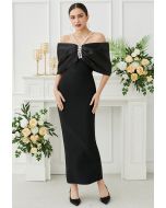 Maxikleid mit Strass-Dekor und großer Schleife und kalten Schultern in Schwarz